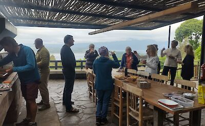 Gathering for dinner at the lodge on Argentina to Chile bike tour. toAT