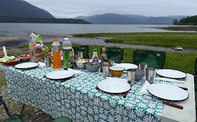 Outdoor meals by the water on Argentina to Chile bike tour. toAT