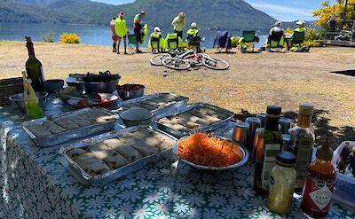 Shared meals lakeside on Argentina to Chile bike tour. toAT
