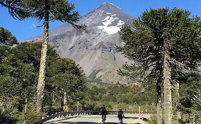 Snow-capped volcanoes on Argentina to Chile bike tour. toAT