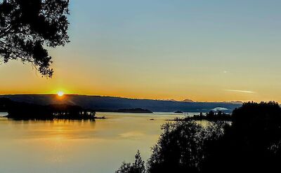 Sunset over Patagonia lakes on Argentina to Chile bike tour. toAT