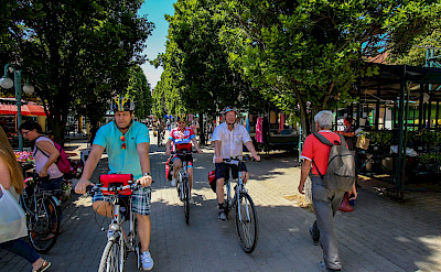 Biking past a market in Hungary. &copy;TO