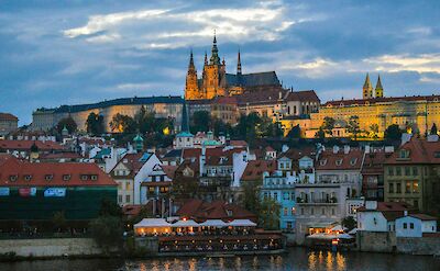 Prague Castle illuminated at dusk. pexels@Shahbazzaman