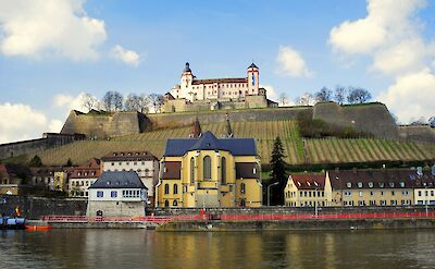 Marienberg Fortress rising above W&uuml;rzburg and the Main River. Flickr@Abhijeet Rane
