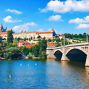 Prague to Aschaffenburg - The Vltava River in Prague, with Prague Castle rising above. unsplash@lea