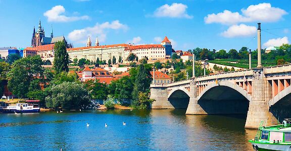 The Vltava River in Prague, with Prague Castle rising above. unsplash@lea