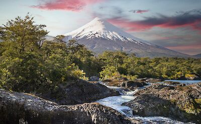 Osorno Volcano rising above the Petrohu&eacute; River. unsplash@vladimir fedotov