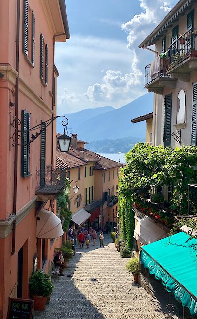 Narrow streets and pastel buildings of Bellagio. cc@Heather
