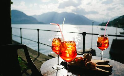 Aperitivo at sunset with lake views. unsplash@GiuliaSquillace