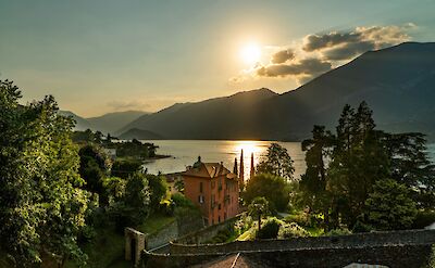 Sunset over the lake and surrounding mountains. Unsplash@MarcoAngelo
