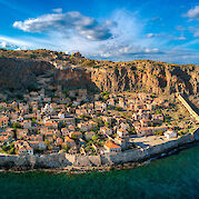 Southern Peloponnese E-Bike Tour - Aerial view of Monemvasia fortress town surrounded by the Aegean Sea. toABB