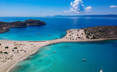Simos Beach on Elafonisos with turquoise water and white sand dunes. toABB