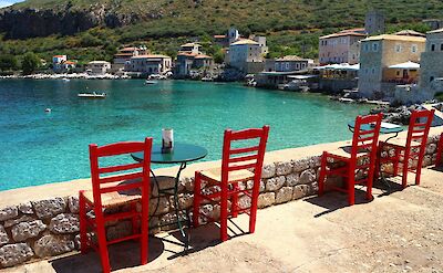 Harborfront dining overlooking Limeni Bay. toABB