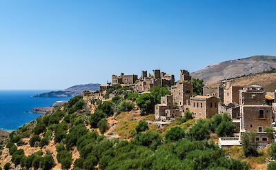 Stone tower houses in the historic village of Vatheia. toABB