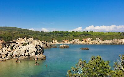 Turquoise bays and rocky coastline near Alghero on Sardinia's northwest coast. Unsplash@DomenicoAdornato