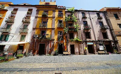 Traditional architecture and cobblestone streets in Bosa, Sardinia. unsplash@JurgenScheeff