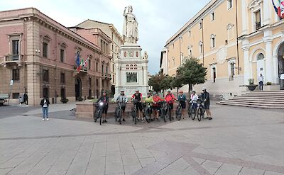 Cyclists in Piazza Eleonora d'Arborea. toBTS