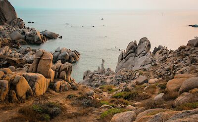 Rocky shoreline along Sardinia&rsquo;s western coast. unsplash@anthonyDean