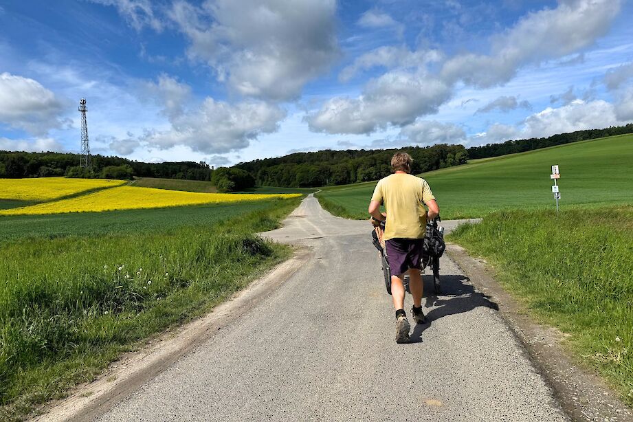 Karl Bushby walking through the countryside in Waldb&uuml;ttelbrunn, Germany. CC:Rosalind Perrett