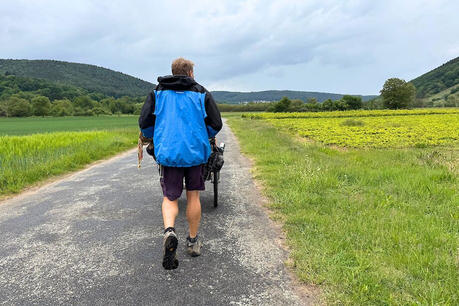 Karl Bushby walking through the fields of Germany. CC:Rosalind Perrett
