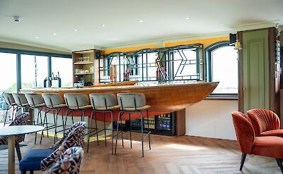 Relax with panoramic views from the stylish lounge aboard the Magnifique X..