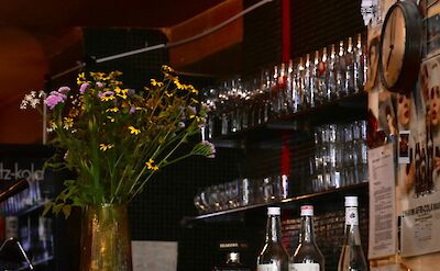 Inside a bar in Austria. Unsplash@Sara Sedlmajerova