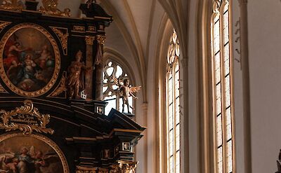Inside a church in Durnstein, Austria. Unsplash@Roman Vasylovskyi
