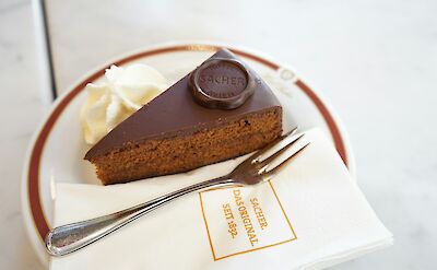 A slice of Sachertorte, Austria. Unsplash@Luke Wang