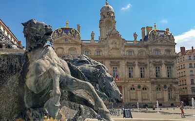 Bartholdi Fountain in Place des Terreaux with Lyon City Hall. unsplash:JonneMakikyro