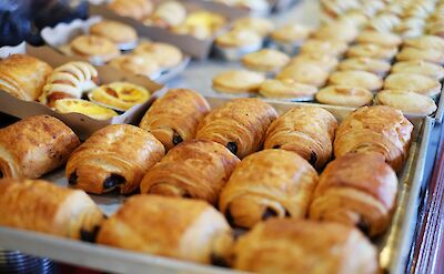 Fresh baked pain au chocolate at a local bakery. unsplash:MinkMingle