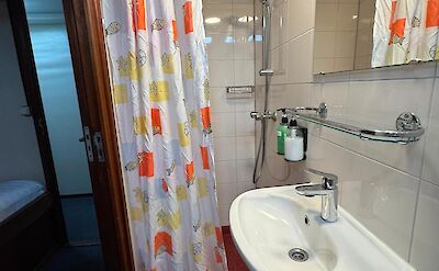 Shower | Clair de Soleil | Bike & Boat Tour