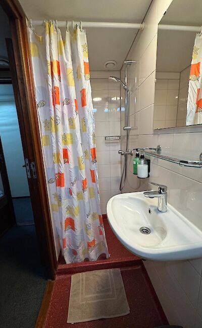Shower | Clair de Soleil | Bike & Boat Tour