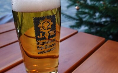 A glass of traditional German lager at an outdoor caf&eacute;. pexels:pexels:MagdaEhlers