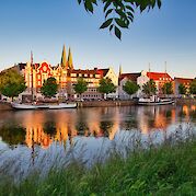 Hamburg to Lübeck: Old Salt Road - Lübeck's waterfront along the Trave River. Pixabay:justmarius