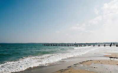 Beach and pier in Travem&uuml;nde on the Baltic Sea. unsplash:ChristianLue
