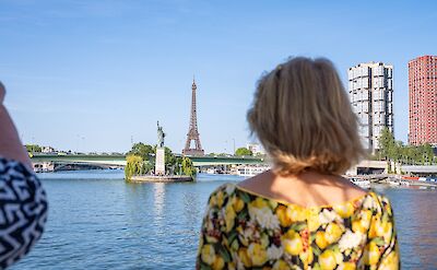 Viewing the Eiffel Tower and the Seine River from the boat in Paris. toTN