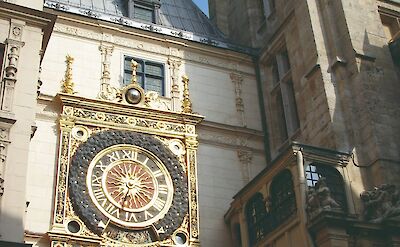 Le Gros Horloge, mounted on a stone facade in Rouen. toTN