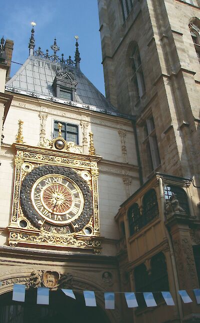 Le Gros Horloge, mounted on a stone facade in Rouen. toTN