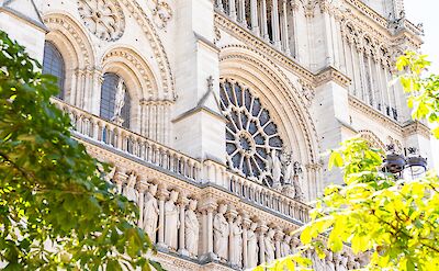 The stone facade of Notre Dame Cathedral in Paris. toTN
