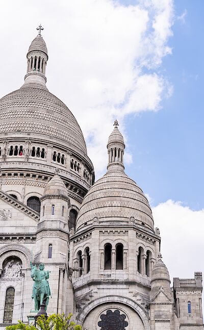 The domes of the Basilica of Sacre-Coeur de Montmartre in Paris. toTN