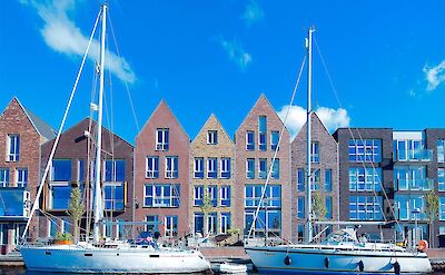 Colorful waterfront architecture in Haarlem. Pixabay