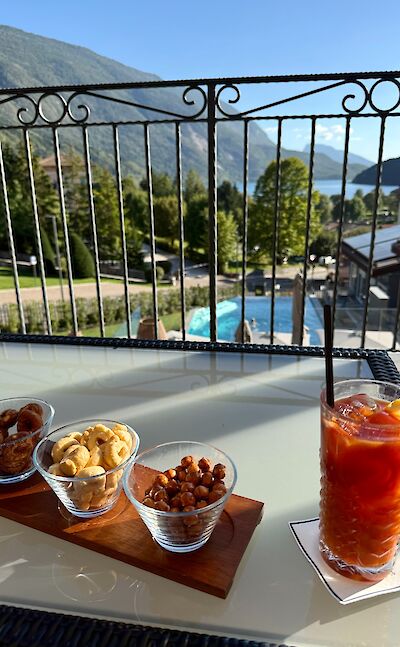 Lake views and drinks in Molveno after the hike. cc:Tripsite