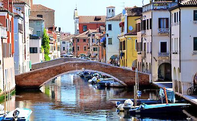Canals and colorful buildings in Veneto. toGL