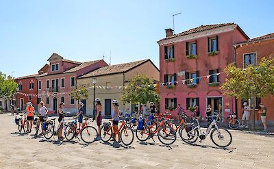 Cyclists gathered in a Venetian island village. toGL