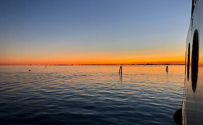 Sunset over the Venetian waterways. toGL