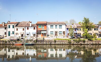 Quiet waterfront homes along the Venetian canals. toGL