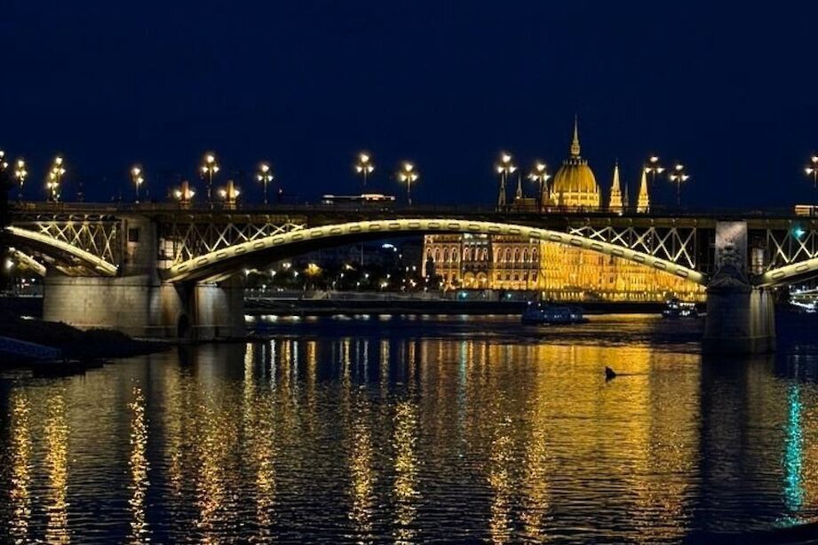 Reflections of Budapest on the river. CC:Stuart Fabel