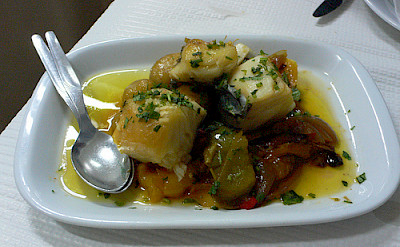 Salt cod with peppers at Casa do Lentejo in Lisbon. Photo via Flickr:heatheronhertravels