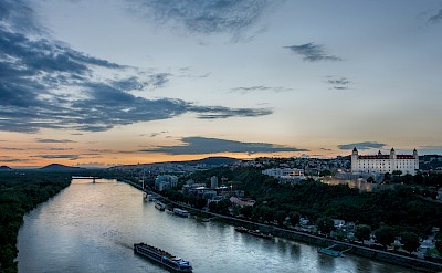 Barge cruise at sunset in Bratislava, Slovakia. Unsplash@Kristina Kruzkova
