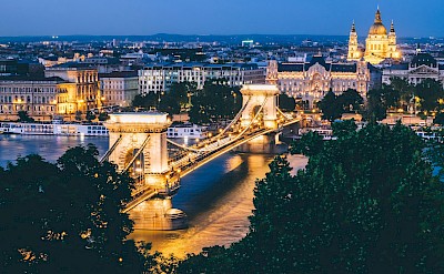 Budapest illuminated at night, Hungary. Unsplash@Dan Freeman